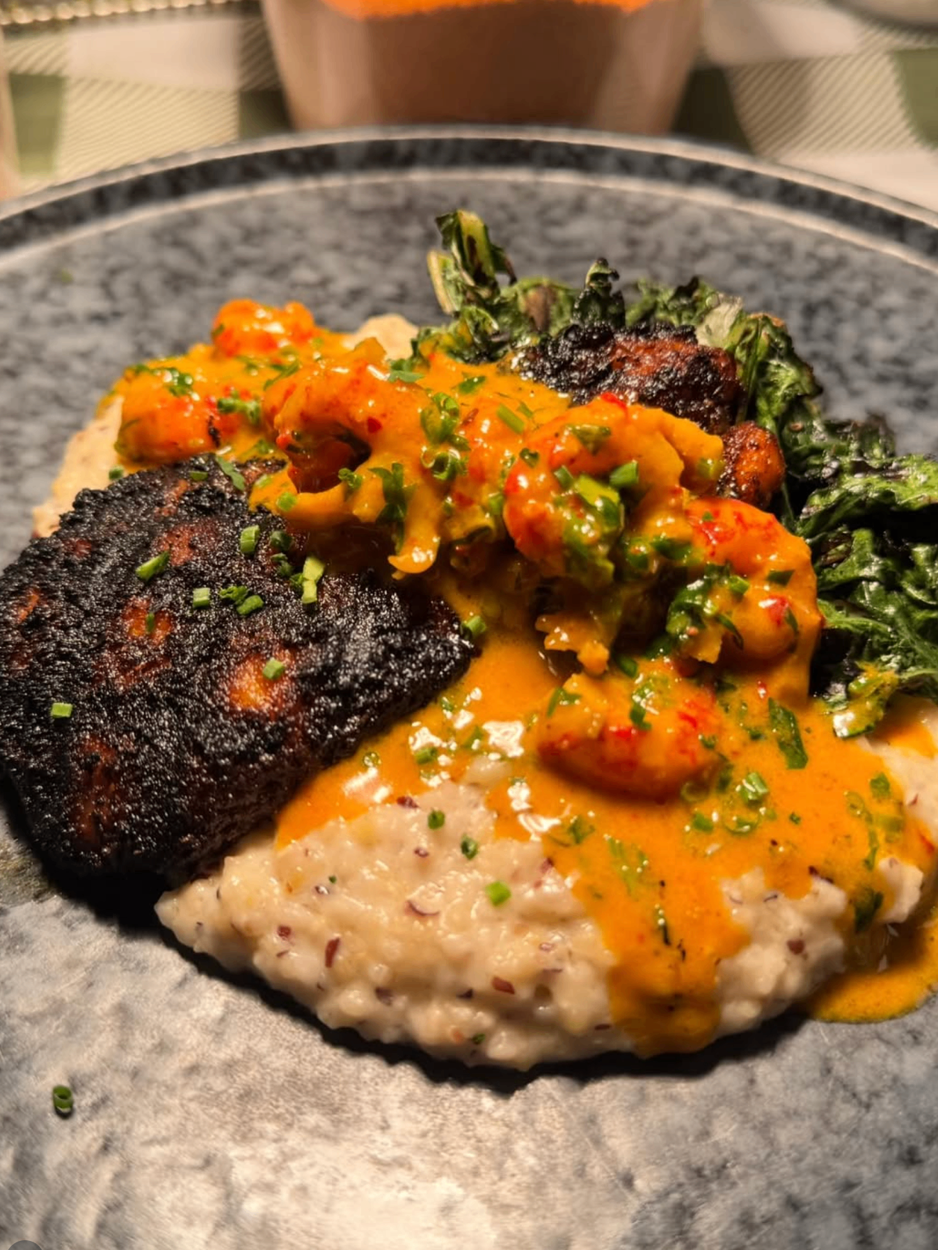 Catfish on grits with crawfish gravy